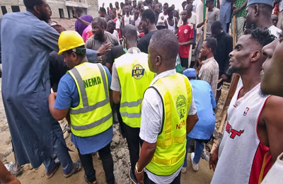 A Lagos building collapse in Mushin left one dead and three injured. The building was under construction. Rescue efforts continue.