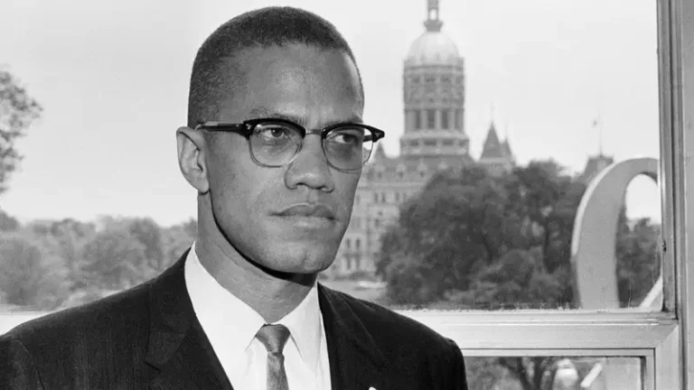 Malcolm X speaking at a rally before his assassination in 1965