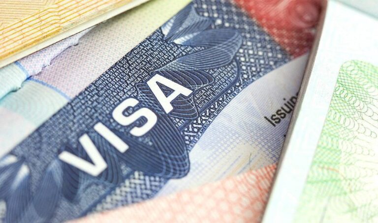 Visa Waiver Program application form and passport, showing ESTA requirements.