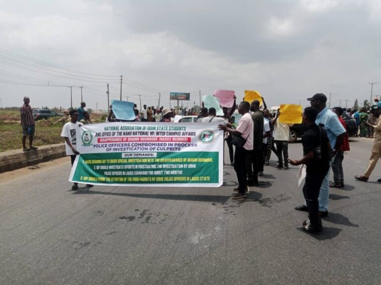 Students protest the disappearance of LASU graduate Quadri Ogunbode on the Lagos-Ibadan Expressway. They demand police action. Where is Quadri?