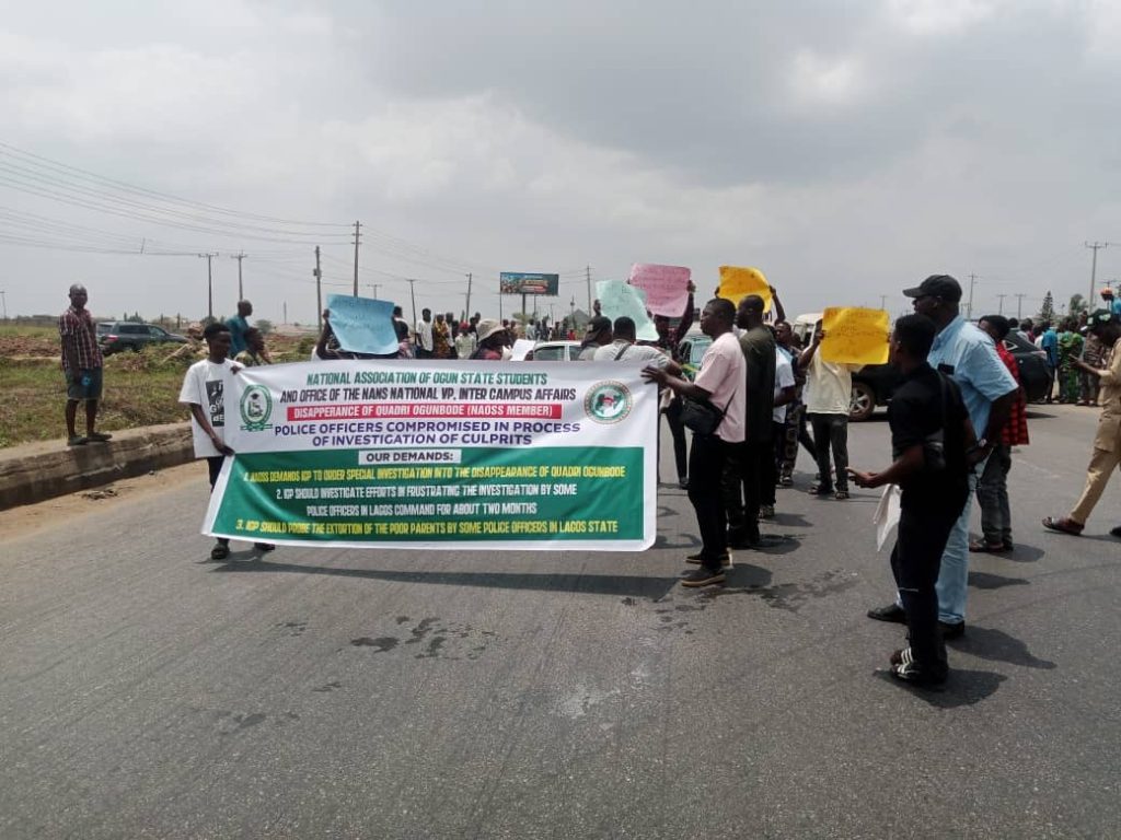 Students protest the disappearance of LASU graduate Quadri Ogunbode on the Lagos-Ibadan Expressway. They demand police action. Where is Quadri?