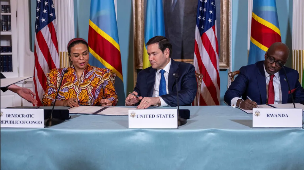 Rwanda DR Congo agreement signed in US. Nations pledge sovereignty respect, target May 2025 peace deal. Reports of ongoing violence continue