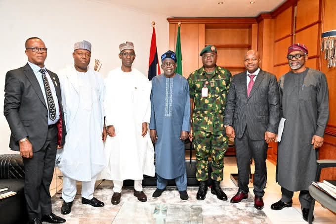 Following deadly attacks, President Tinubu orders security overhaul. Meets security chiefs, declares "Enough is enough," seeks new strategy.