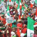 Nigerian workers mark May Day, demanding better wages and N70,000 minimum wage implementation amidst severe economic hardship and rising inflation.