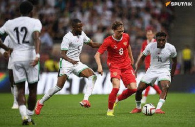 Super Eagles Russia friendly ends 1-1 in Moscow. Arokodare scores debut goal after Ajayi own goal. Finidi praises team's resilience.