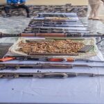 Nigeria Police bust arms network supplying bandits, recover rocket launcher, AK-47s, 2,200+ rounds. Three suspects arrested in raids.