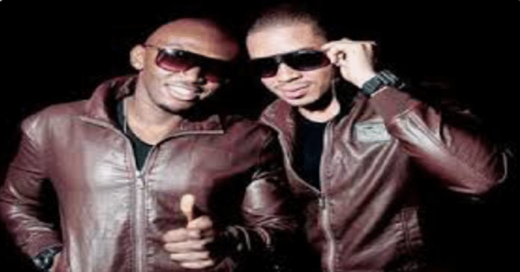 Nigerian music duo Bracket on stage with microphones performing at Lagos entertainment venue
