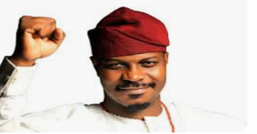 Gbadebo Rhodes-Vivour receives ADC membership flag during defection ceremony in Alimosho Lagos"