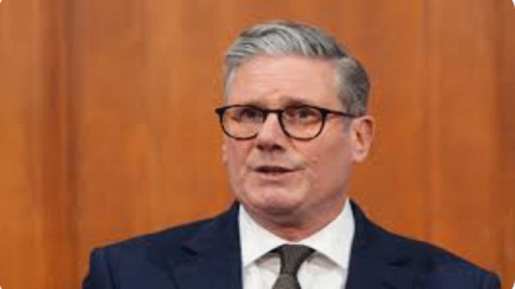 UK Prime Minister Keir Starmer speaking at podium with British flag, announcing Palestinian state recognition