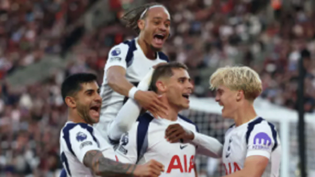 Tottenham players celebrate goal against West Ham at London Stadium in Premier League match